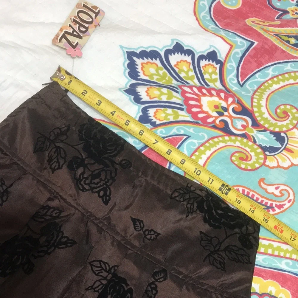 Metallic bronze dark floral bubble skirt with velvet rosette